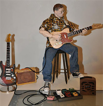 Terry Buffalo Ware action figure with guitars